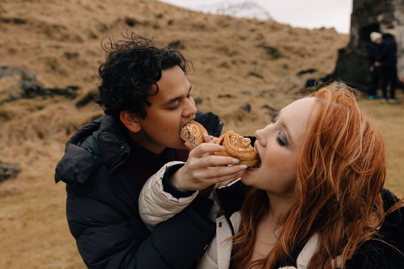 Emelyne and Bishal.sharing cinnanmon rolls
